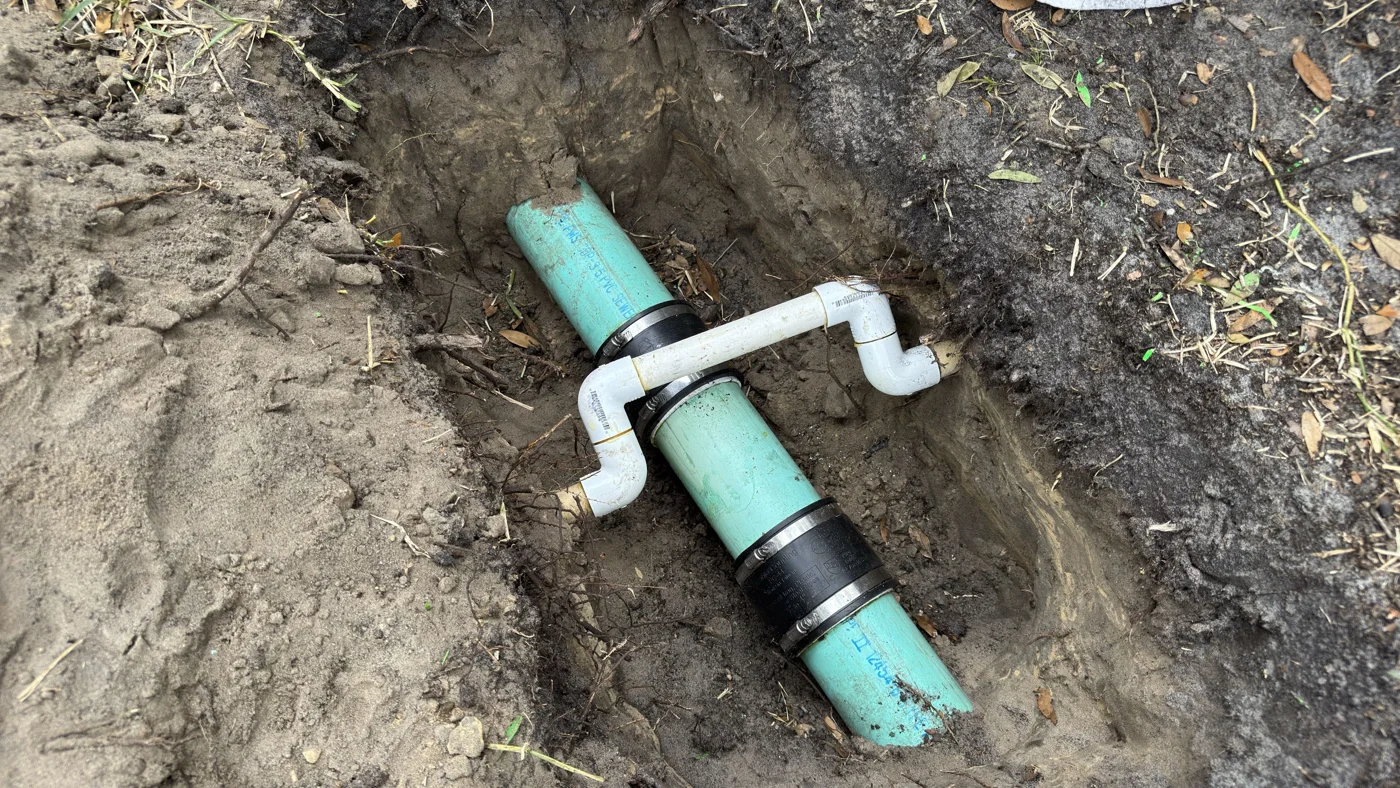 Repaired sewer pipe and adjacent plumbing
